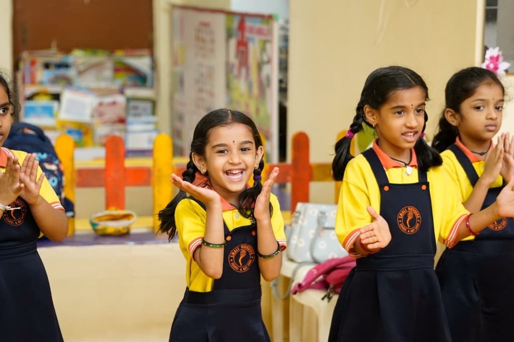 Happy clapping children at Small Wonders